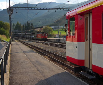Local MGB train and arriving motorail train