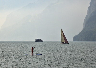 Three different watercrafts on Lake Lucerne