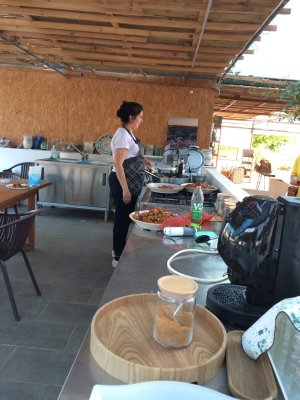 Prepairing a snack for us at Gli Aromi Gardens