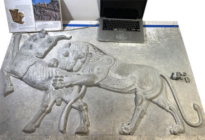 lion and bull reprodution relieve -  walls of Persepolism - ancient  Persian  work in progress