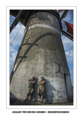 Millers Johan and Jan enjoying the warm sun on the mill.