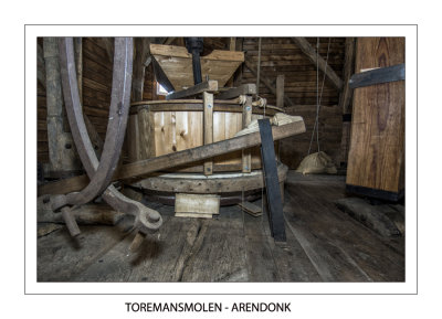In the bac a grinding chair(2 millstones with wooden casing)