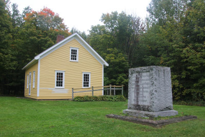 In front of the museum is the stone showing where the family cottage once stood.