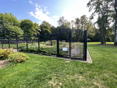 Gate surrounding the vegetable garden.