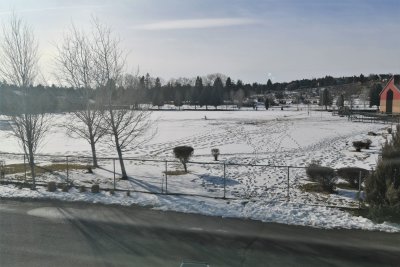 complex backs to school play field