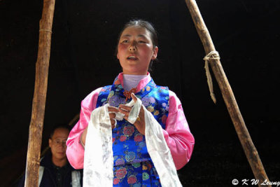 A Tibetan lady sang inside a Tibetan tent 01