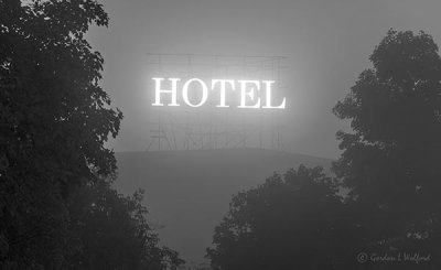 'HOTEL' Sign On A Foggy Night P1470323-9