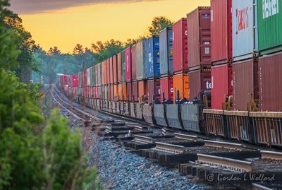 Long Freight Train At Sunrise P1540385-91