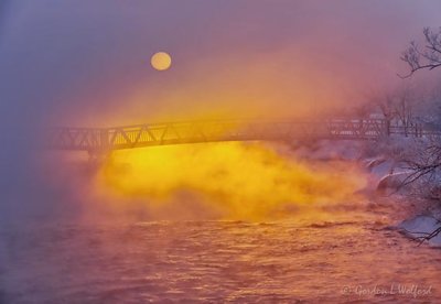 Sun Rising Beyond Footbridge In Mist 90D15698