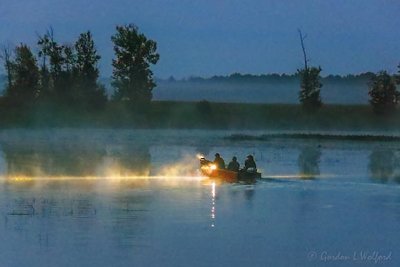 Hunters In Boat At First Light 90D36323