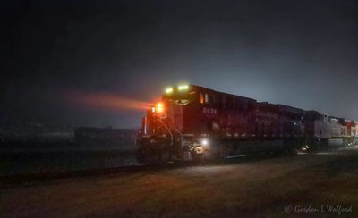 Westbound Freight Train On A Foggy Night 90D39570
