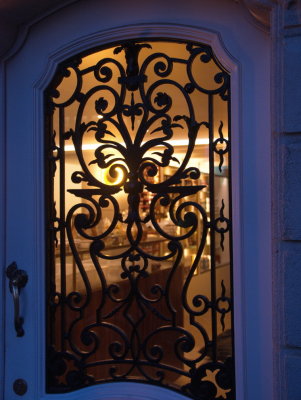 Chocolate behind a wrought iron door