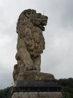 Lion in honour of Kings Léopold II and Baudouin