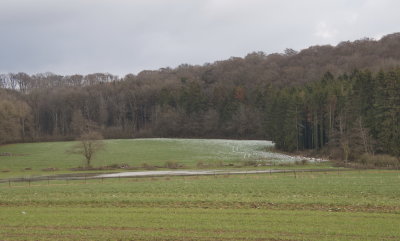 Some snow and flooded fields