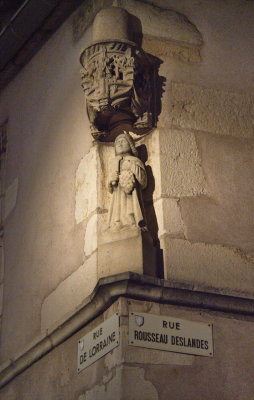 Sculpted figure decorating an old house