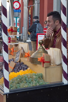 Man selling Ghent Noses - colourful fruit gums