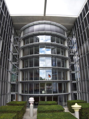German flag reflected in the windows of the Bundestag