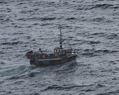 Fishing at sea in choppy waters