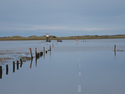 Inundated causeway to Holy Island with refuge hut