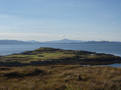 Cottages at Strathcarron Coral Beach with Raasay across the Inner Sound