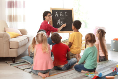 Teacher-and-Class-ABCs-on-Chalkboard.jpg