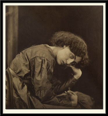 Jane Morris seated on a divan, 1865