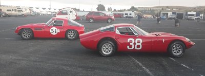 Two red British sports cars