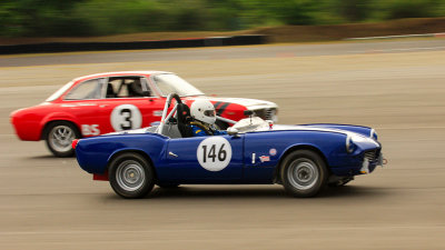 Triumph Spitfire and an Alfa