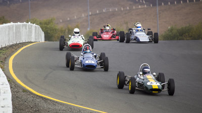 Three Lotuss leading the way into turn 6.