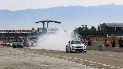 The Cadillac Pace car doing a burn out on pit lane to start the 2013 Pirelli World Cup.