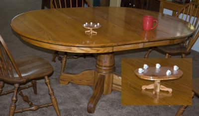 This is the real life dining room table with the miniature on top (and shown in the inset)