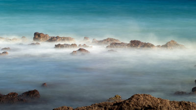 Sea mist over rocks