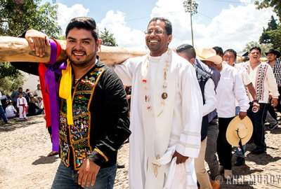 Men carrying the palo encebado