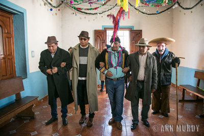 The men getting ready to dance