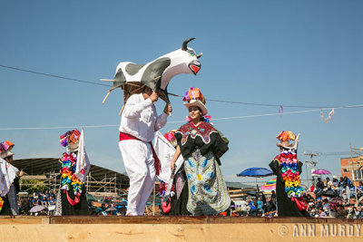 Dancers from Caltzontzin with torito