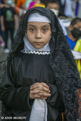 Little girl portraying the Virgin Mary