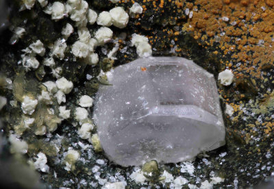 Phosgenite and unknown brown, green and white mineral.