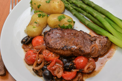 Lamb Steaks with Olives and Tomatoes