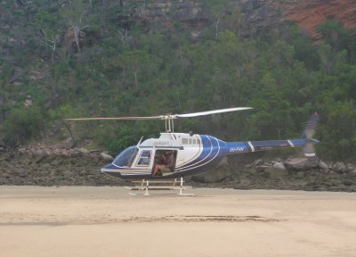 Prince Frederick Harbour,   Helicopters on beach for trip to Mitchell Falls