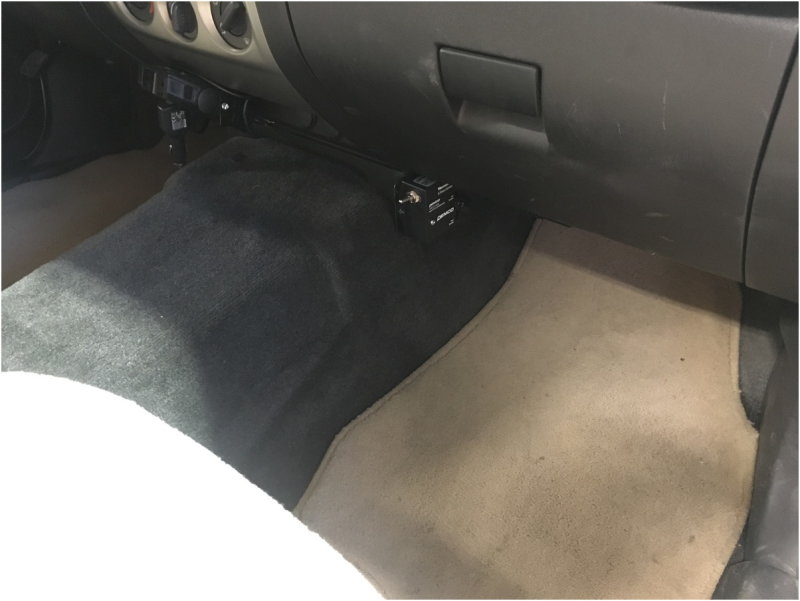 Demco control unit next to passenger footwell