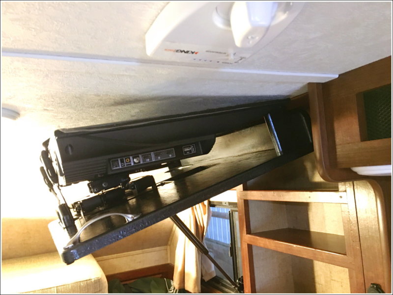 TV in storage position, door open - ceiling clearance checks