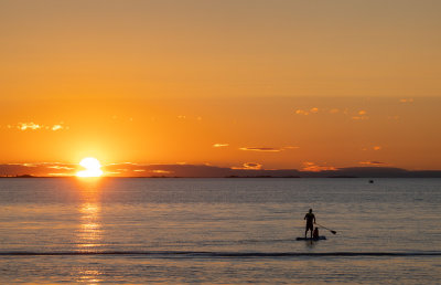 On a SUP towards the sunset