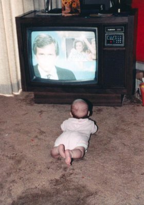 1983 09 Melissa Asher catching up on the news.jpg