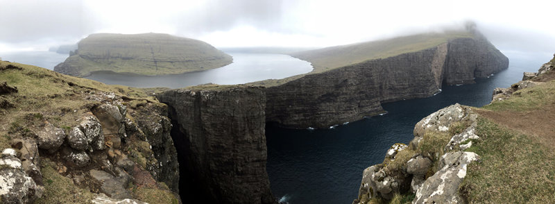 Panoramic view of the lake Søgvágsvatn/Leitisvatn and the cliffs of Trælanípan, Vágar, Faroe Islands