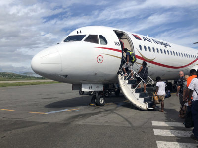 Boarding an Air Niugini Fokker 100 at Port Moresby