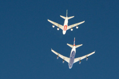 Emirates A380 (A6-EEJ) with a British Airways B747-400 in flight over the Gulf