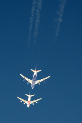 Emirates A380 (A6-EEJ) with a British Airways B747-400 in flight over the Gulf