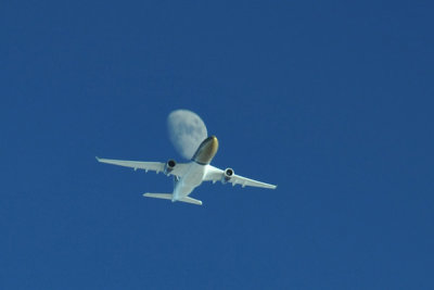 Gulf Air A330 captured in flight with the 3/4 moon