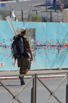 Soldier with lulav during Sukkot