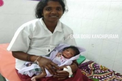 The woman who went into labour immediately after Darshan of Athivaradhar  is Vijaya.